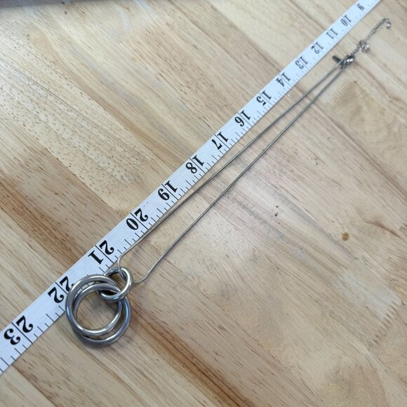 Lani Silver Tone Intertwined Ring Pendant Necklace 23" With Adjustable Chain - Picture 4 of 11